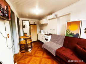 Microcasa com vista para o Cristo